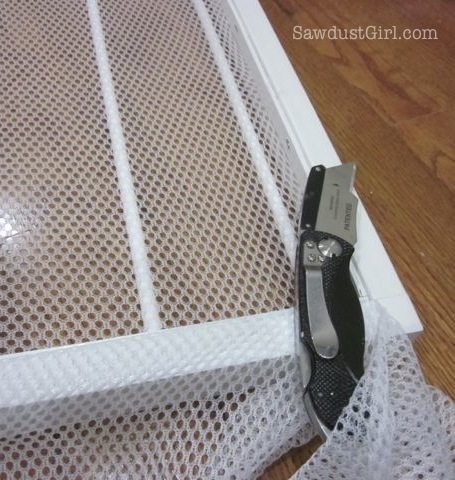DIY pull-out sweater drying rack.