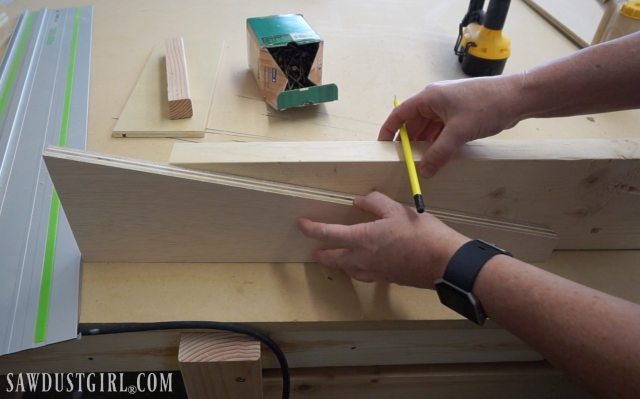 Tracing diagonal lines onto  cantilevered shelf brackets pieces