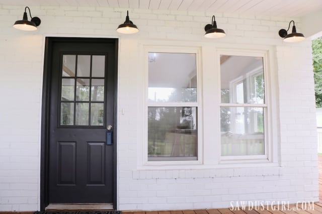 front porch with black door