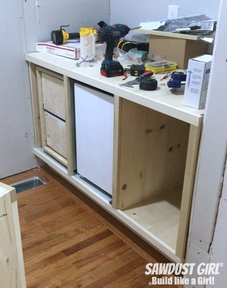 Build a blind corner cabinet with NO wasted space! Plan and tutorial from https://sawdustgirl.com. 