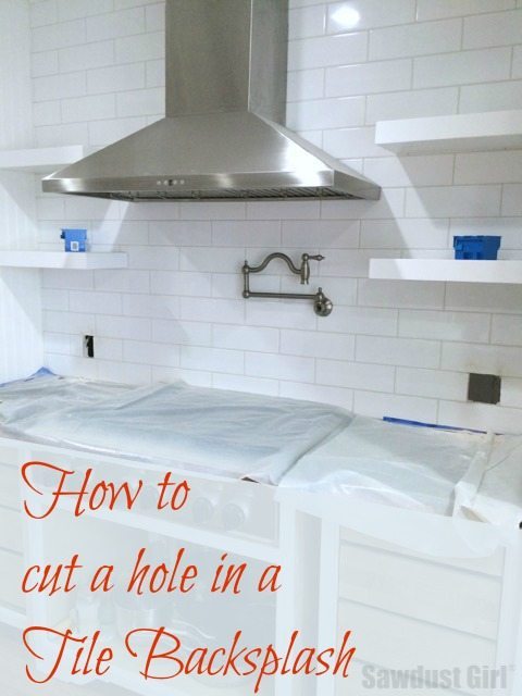 How to cut a hole in a tile backsplash