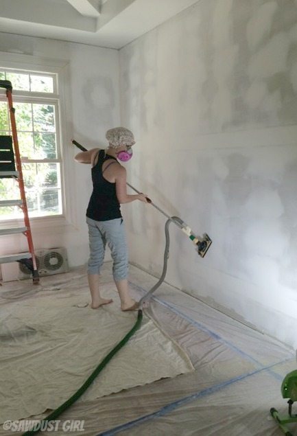 Dust-free drywall sanding - shower cap hair protection. Hey, it works!