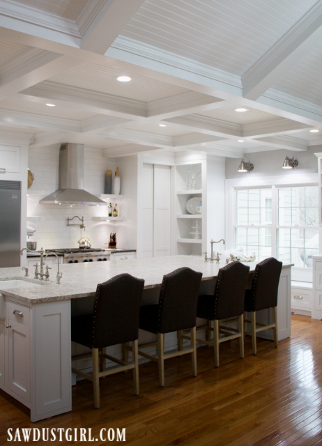 Box beam ceiling in white kitchen