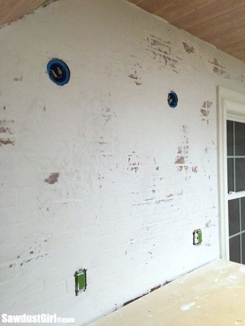 Using faux brick panels to create the look of Brick and Plaster