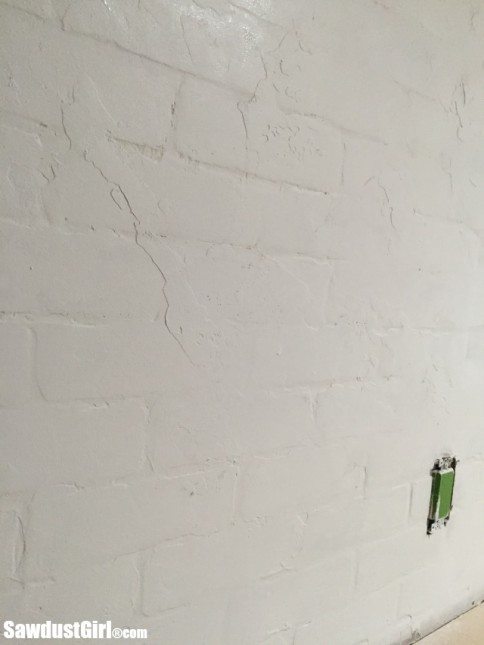 How to create a faux brick and plaster wall.