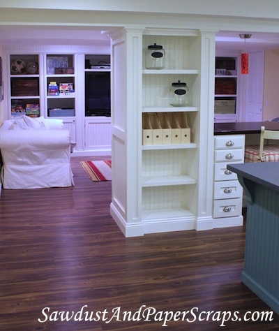 Spacious built in storage cabinets in craft room.