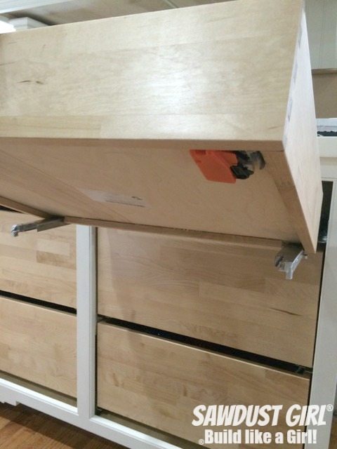 Installing cabinet drawers with Blum Tandem plus Blumotion drawer slides.