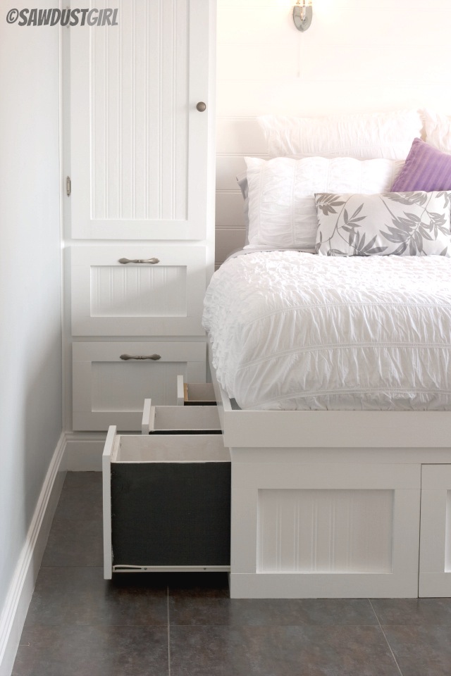 Small bedroom storage solution: Built-in storage bed and built-in wardrobes. https://sawdustgirl.com