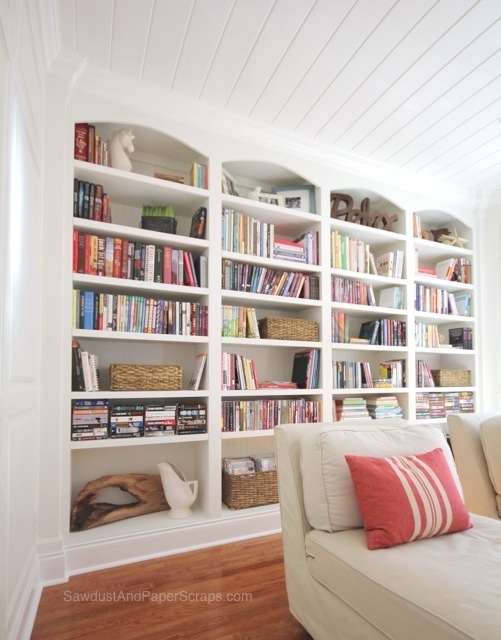 Library with White Painted Built-In Bookshelves