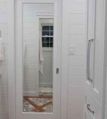Mirrored Pocket Door – Jack and Jill Bathroom Update