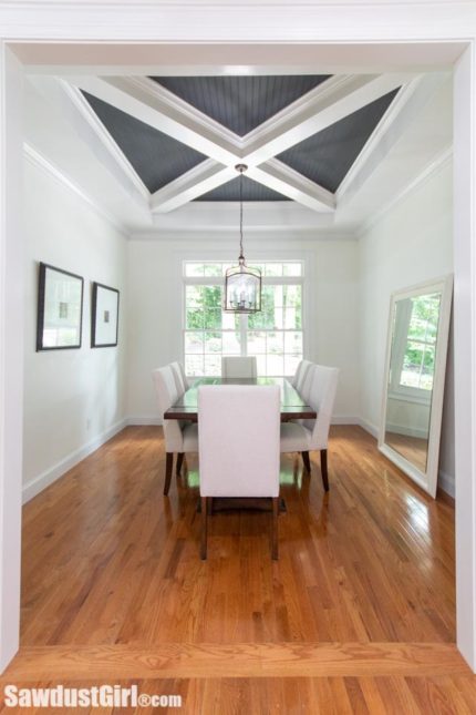 Beautiful dining room with unique ceiling treatment
