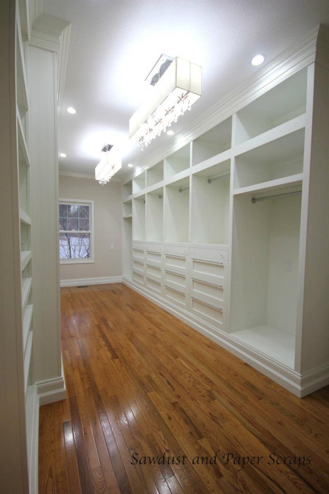 white painted cabinets in built-in closet