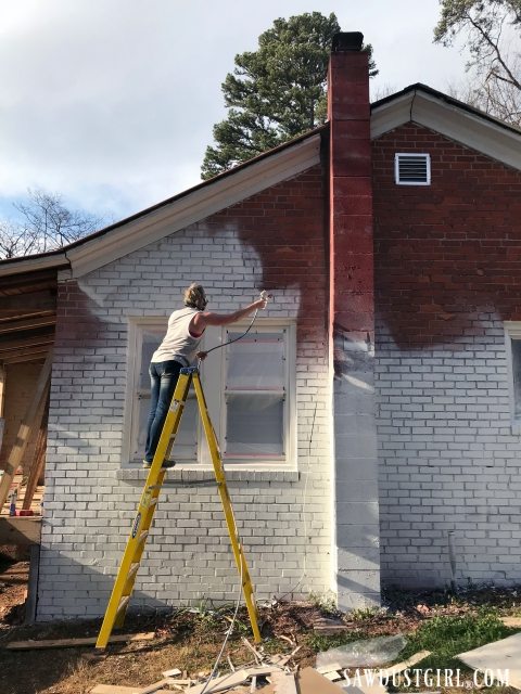 Painting a brick house