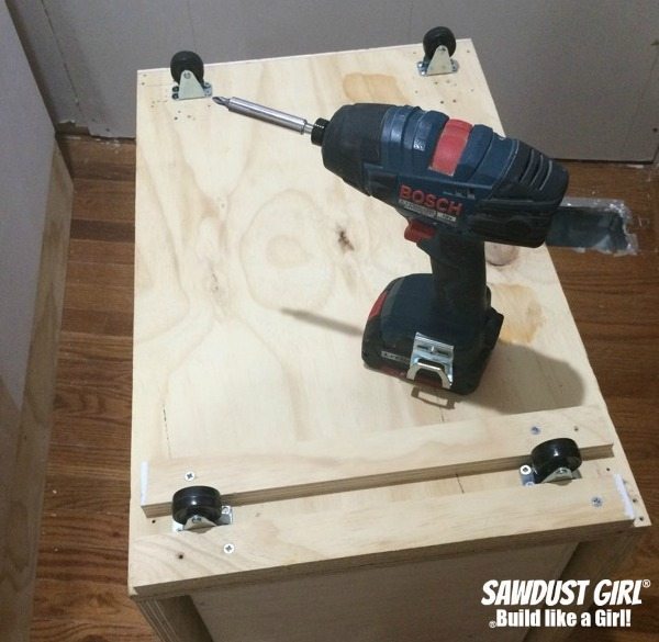 Build a blind corner cabinet with NO wasted space! Plan and tutorial from https://sawdustgirl.com.