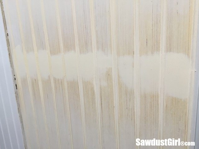 Horizontal seam in beadboard panel almost completely hidden