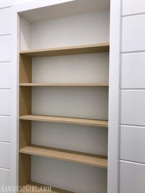 Adding shelves to cabinet