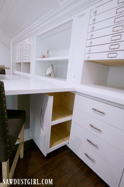Pull out cabinet storage in craft room