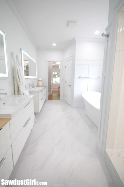 white and bamboo master bathroom