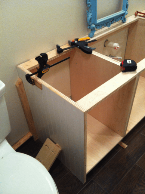 installing DIY cabinets in bathroom